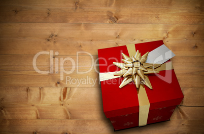 Composite image of christmas present with bow