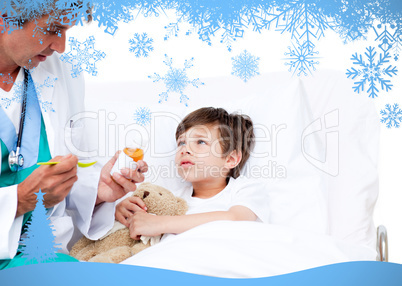 Happy little boy taking cough medicine