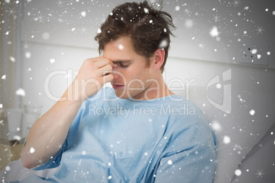 Patient suffering from headache relaxing in hospital