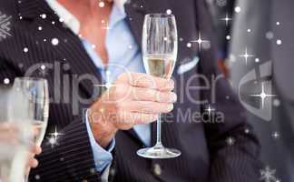 Close up of a senior businessman holding a glass of champagne