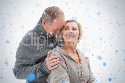 Happy mature couple in winter clothes