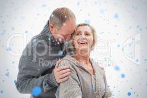 Happy mature couple in winter clothes