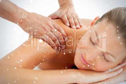 Serene woman enjoying a massage