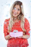 Composite image of blonde woman receiving a gift