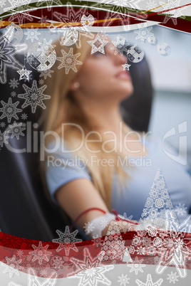 Woman sitting back while getting dialysis