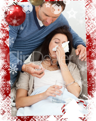 Handsome man taking care of his sick girlfriend