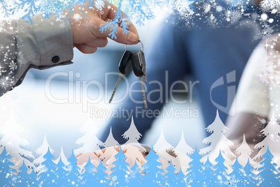 Composite image of car dealer giving keys to a customer