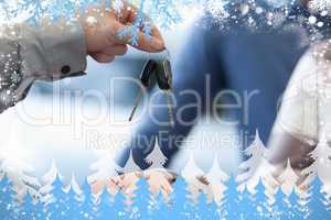 Composite image of car dealer giving keys to a customer