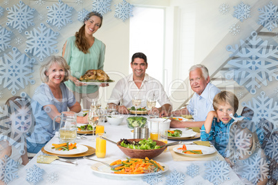 Composite image of family having meal at dining table