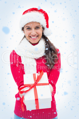 Beautiful festive woman offering gift