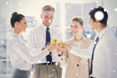 Group of business people clinking their flutes of champagne