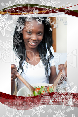 Smiling woman preparing a salad