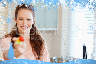 Composite image of woman offering some salad