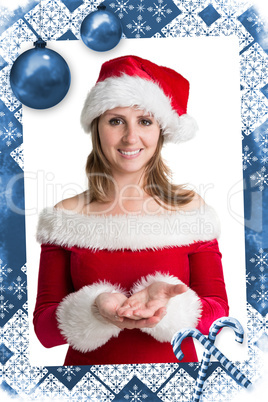 Pretty woman in santa costume presenting your product