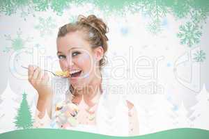 Woman eating fruit and smiling
