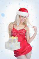 Happy woman holding christmas presents