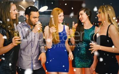 Composite image of talking friends at a bar