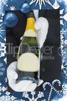 Composite image of close view of open bottle of champagne