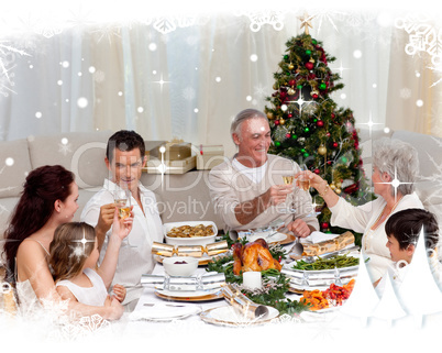 Grandparents and parents toasting in a christmas dinner