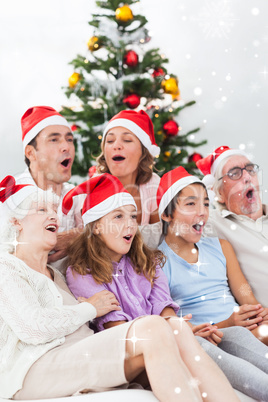 Extended family singing christmas carols
