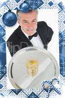 Composite image of waiter serving glass of whiskey on a tray
