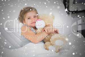 Composite image of cute girl embracing teddy bear in hospital be