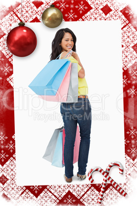 Beautiful woman student with shopping bags