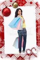 Beautiful woman student with shopping bags