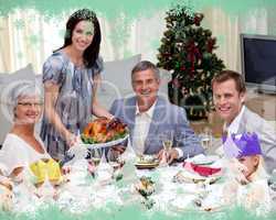 Family celebrating christmas dinner with turkey
