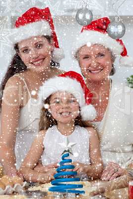 Composite image of daughter mother and grandmother baking christ