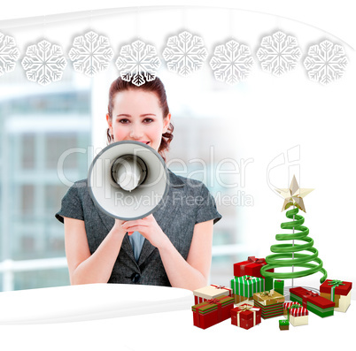 Confident businesswoman yelling through a megaphone