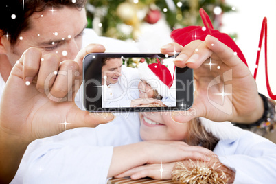 Hand holding smartphone showing photo