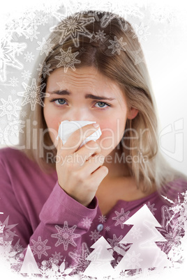 Composite image of woman using handkerchief
