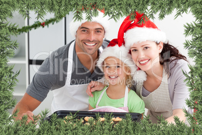 Happy woman with husband and daughter with their biscuits ready