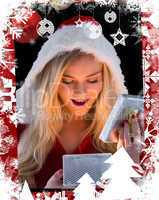 Composite image of pretty blonde in santa outfit opening gift