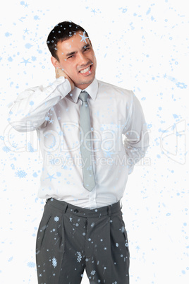 Composite image of portrait of a young businessman having a back