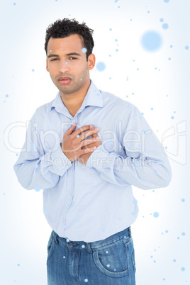 Portrait of a casual young man with chest pain