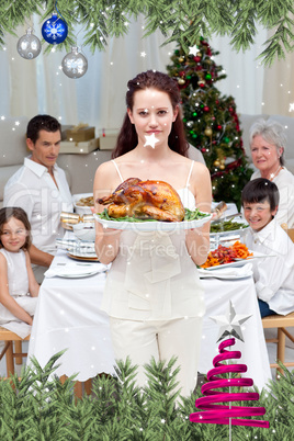 Mother showing turkey for christmas dinner