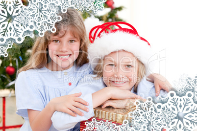 Composite image of adorable childrens celebrating christmas