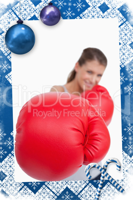 Portrait of a smiling woman boxing