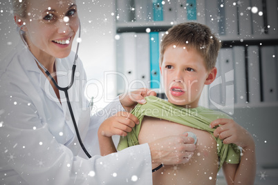 Composite image of confident doctor examining boy with stethosco