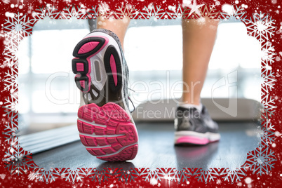 Womans feet running on the treadmill