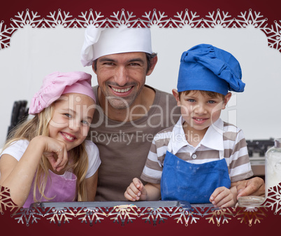 Happy father and children baking cookies together