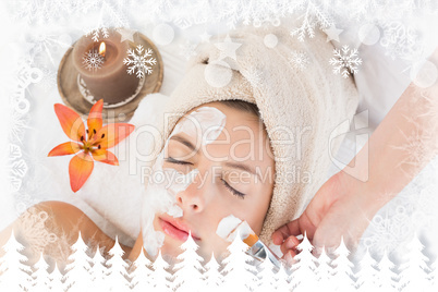 Attractive woman receiving treatment at spa center