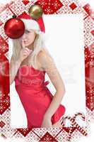 Composite image of young woman wearing santa hat with finger on