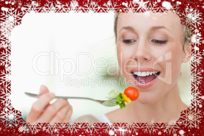 Composite image of woman eating a tomato