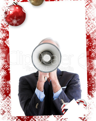 Senior businessman using a megaphone