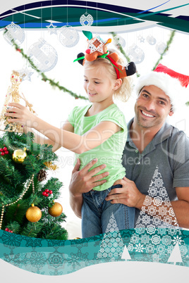 Happy father helping his daughter to put an angel on the christm