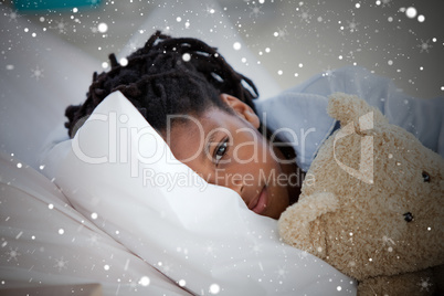 Composite image of young boy in hospital