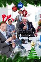 Manager and his team toasting with champagne at a christmas part